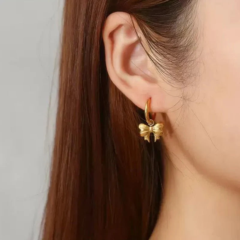 Gilded Ribbon Bow Huggie Earrings