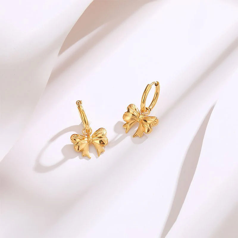 Gilded Ribbon Bow Huggie Earrings