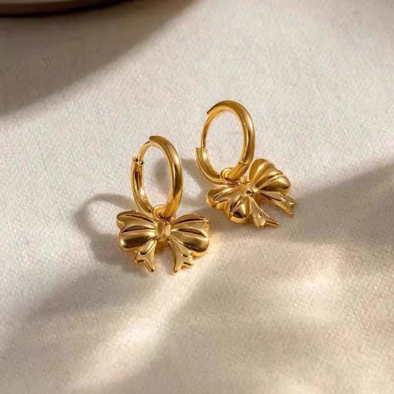 Gilded Ribbon Bow Huggie Earrings
