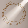 Triple-Layer Gold Bead Necklace