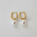 Oval Pearl Huggie Earrings