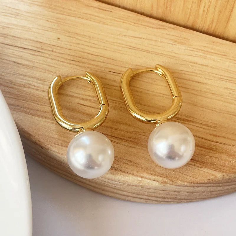 Oval Pearl Huggie Earrings