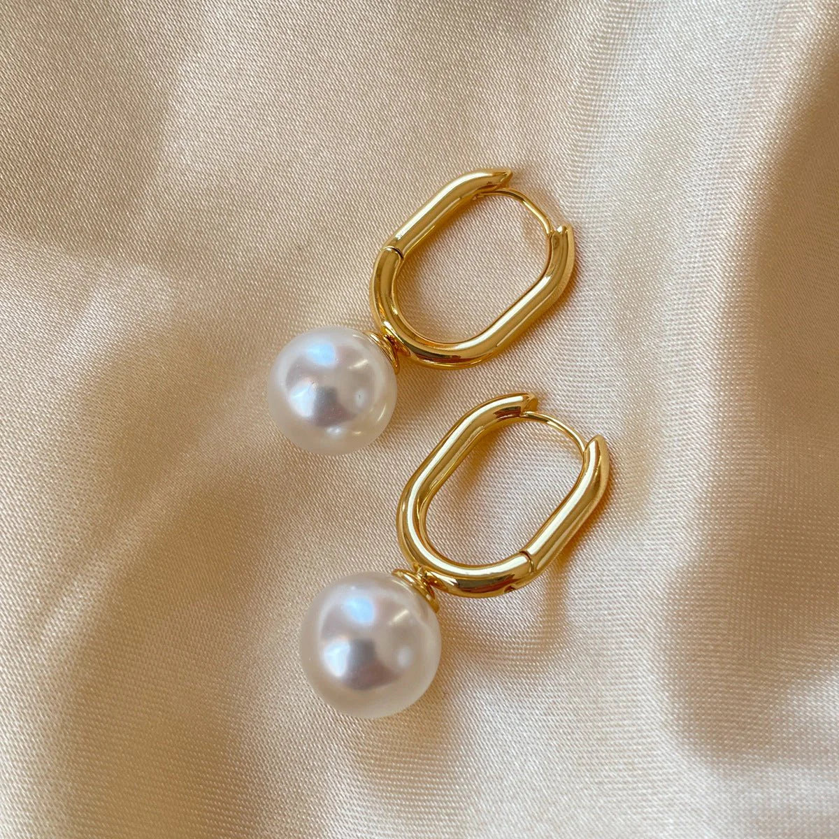 Oval Pearl Huggie Earrings