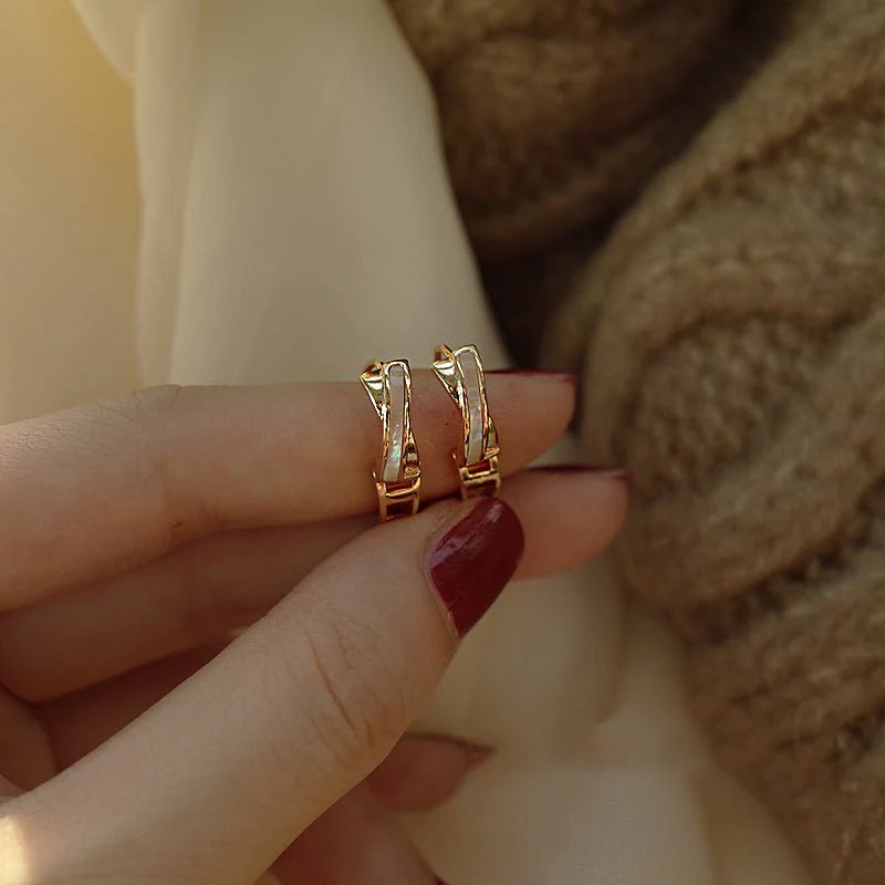 Luminous Criss-Cross Huggie Hoops